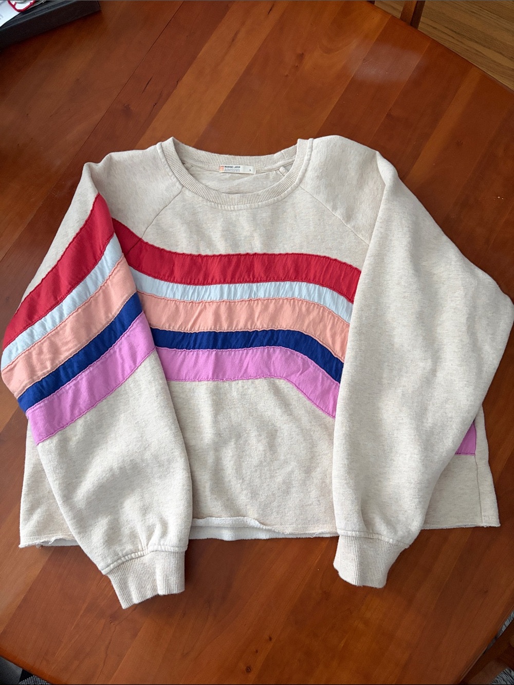 Marine Layer Cream Crewneck Sweater with Red, Pink, Blue & Lavender Wave Stripes